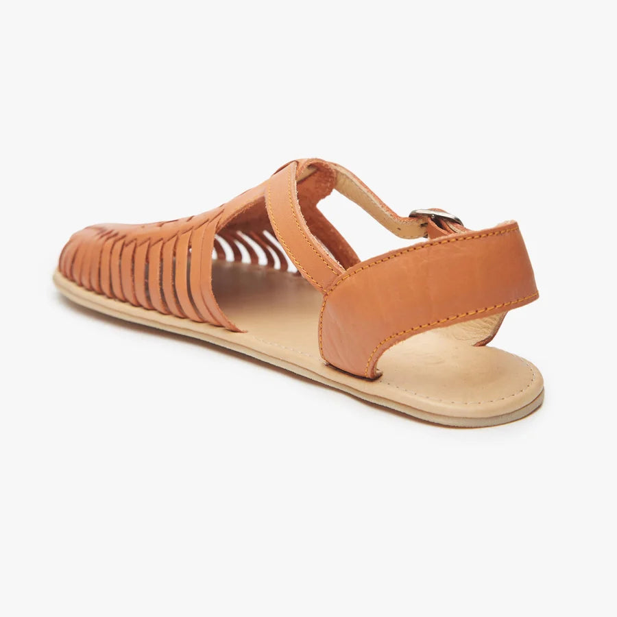 Tan huarache sandal showing heel cup and braided side panels with open toe.