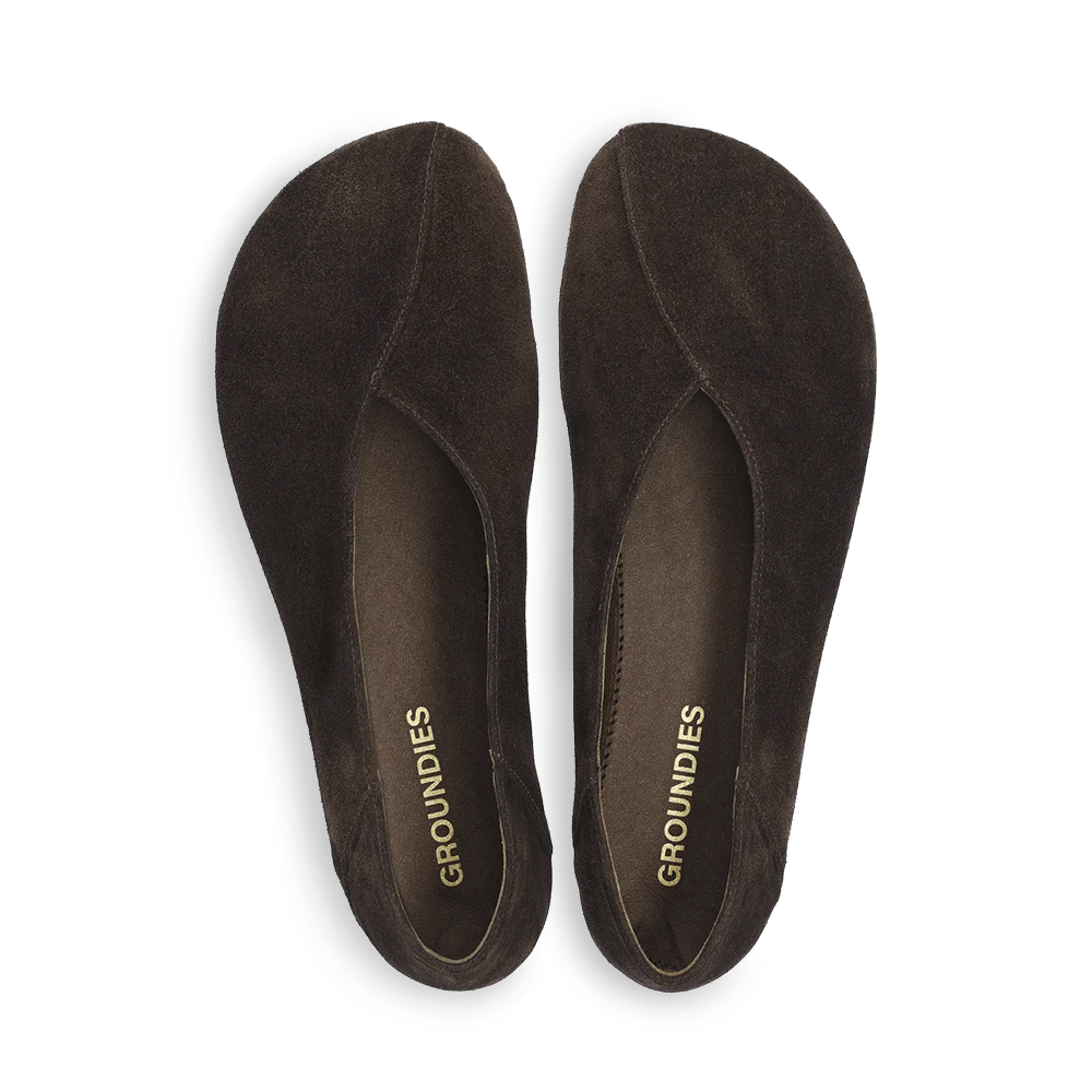 Top view of dark brown Groundies Curve flats with gold branding inside