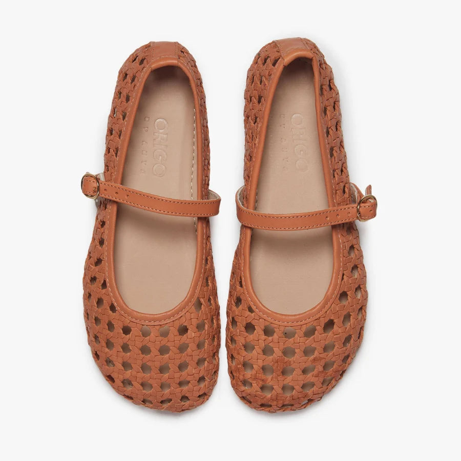Front view of rust-brown woven ballerina flats with ankle strap and rounded toe