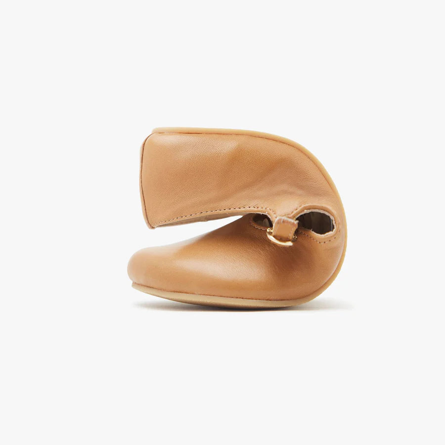 Origo women's tan T-strap flats showing low heel and ankle strap detail
