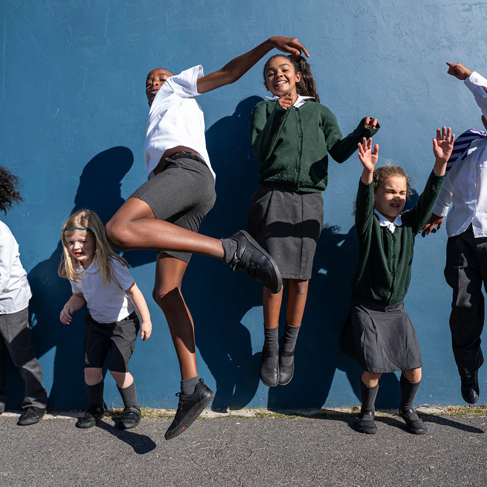 Kids training in Vivobarefoot Primus Ludo School Barefoot Shoes